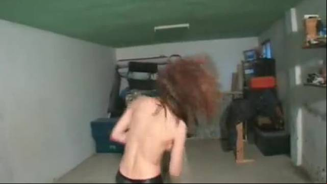 Girl in leather pants kick a guy 01